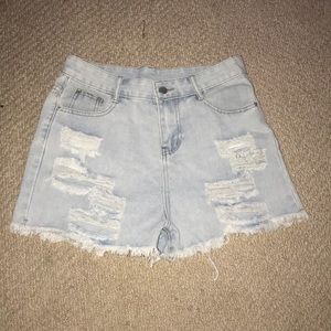 light washed ripped jean shorts